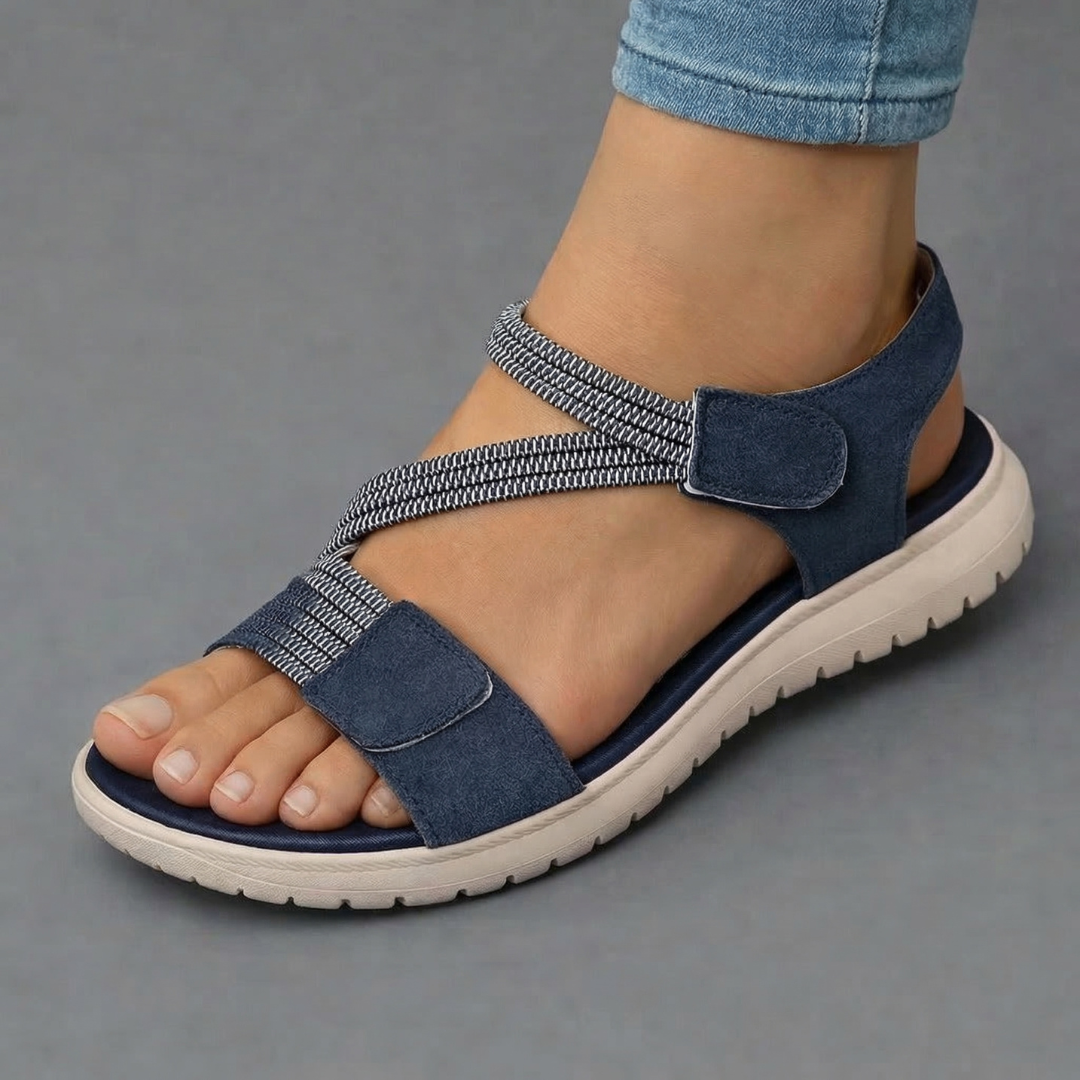 Sandalias ortopédicas azules con tira elástica y doble velcro, suela de goma