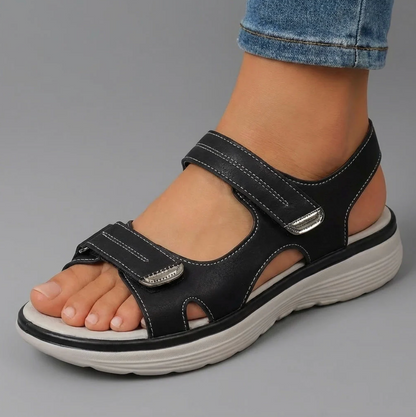 Sandalias ortopédicas antideslizantes negras con velcro y suela robusta acanalada