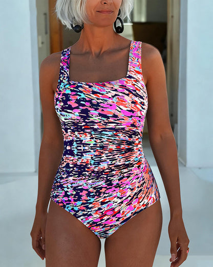 BELLA | Traje de baño de una pieza con tirantes y estampado de colores