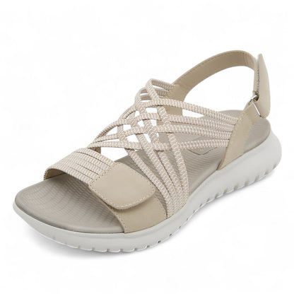 Sandalia ortopédica ergonómica beige con tiras entrelazadas y velcro en el empeine