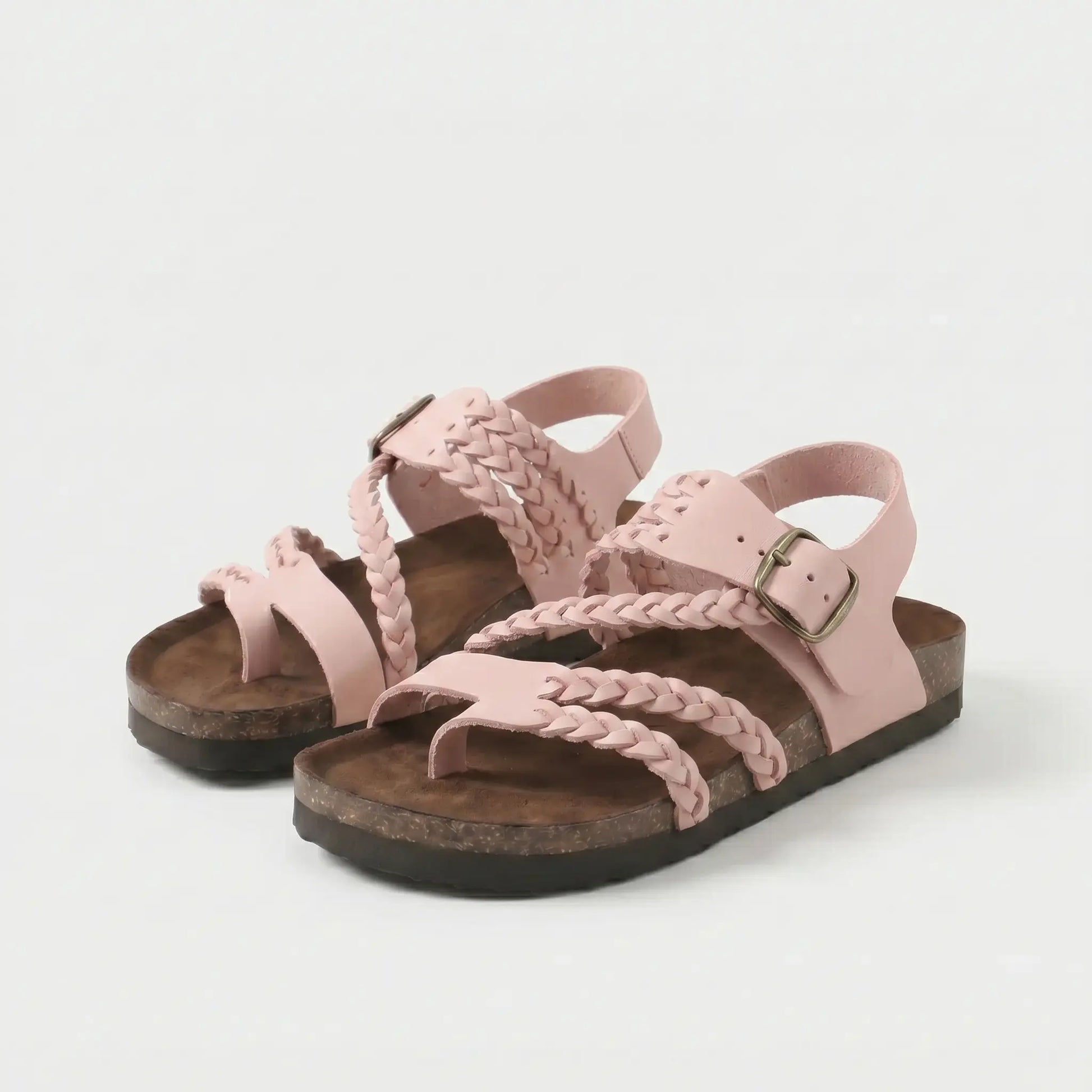 Sandalias ortopédicas rosa claro con correas trenzadas y hebilla, suela de goma