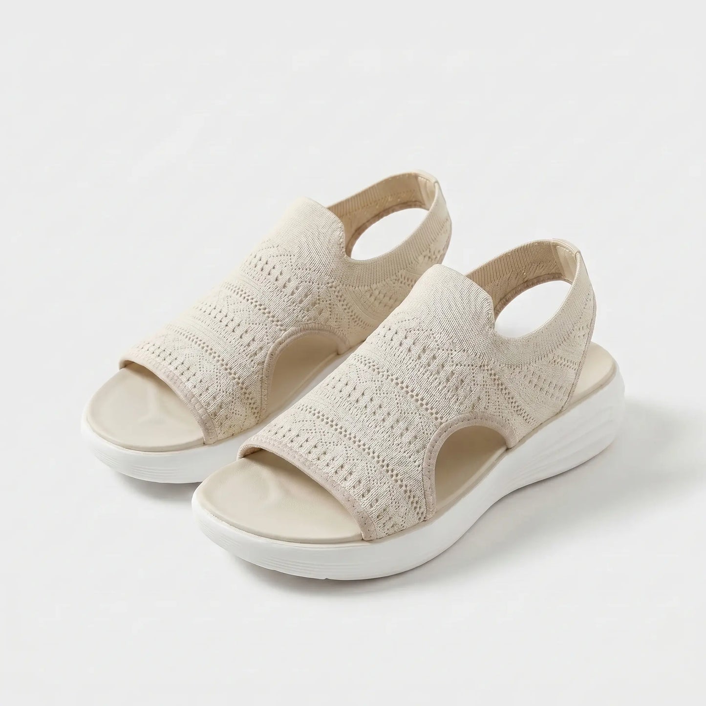 Sandalias ortopédicas de tejido beige, punta abierta y suela blanca acolchada