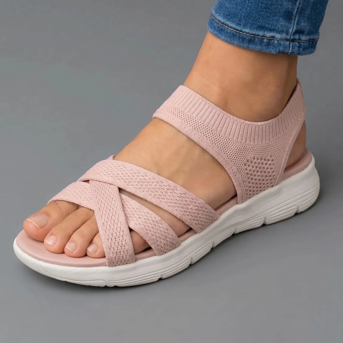 Sandalia ortopédica de confort rosa con tiras cruzadas y suela acolchada