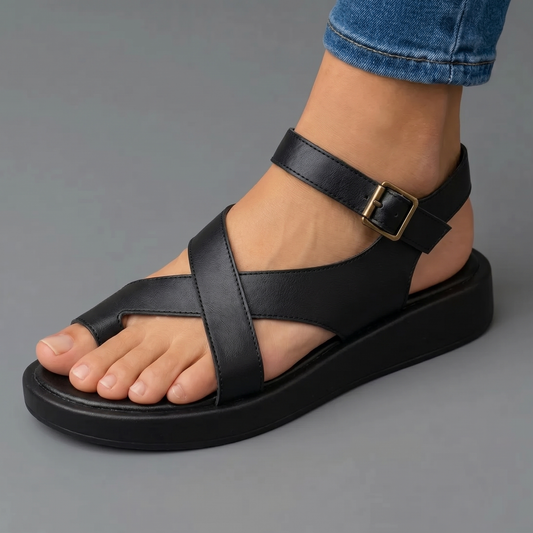 Sandalias ortopédicas negras con tira cruzada y hebilla, suela de plataforma ancha
