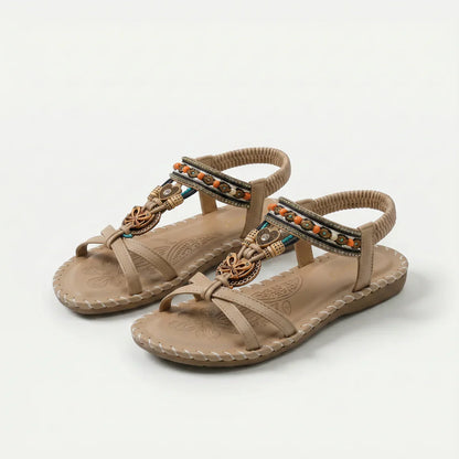 Sandalias ortopédicas beige con tiras decoradas, pulsera elástica y suela acolchada