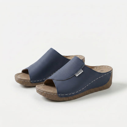 Sandalias tipo zueco con arco plantar, color azul marino, suela de cuña de madera