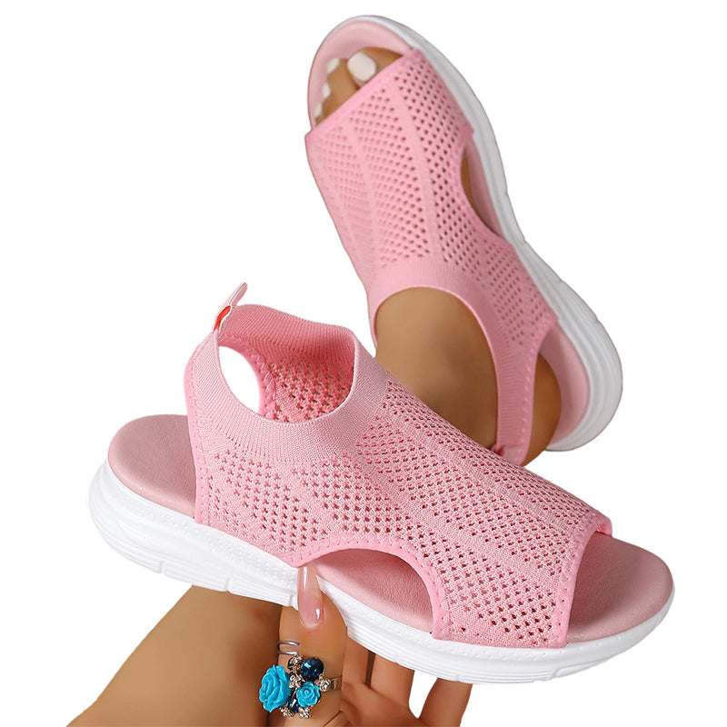 Sandalias ortopédicas cómodas rosa con tejido calado y suela blanca