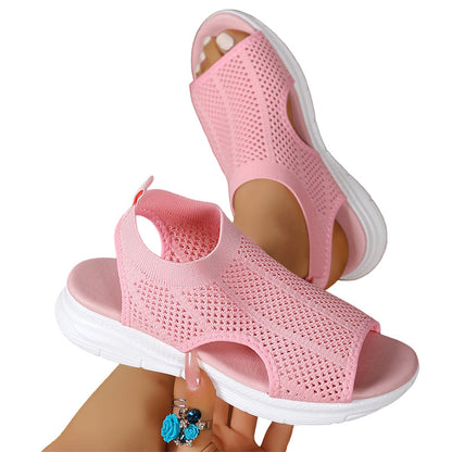 Sandalias ortopédicas cómodas rosa con tejido calado y suela blanca