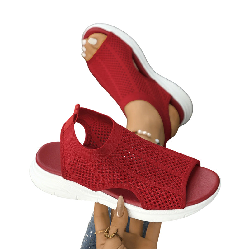Sandalias ortopédicas cómodas rojas con tejido calado y suela blanca